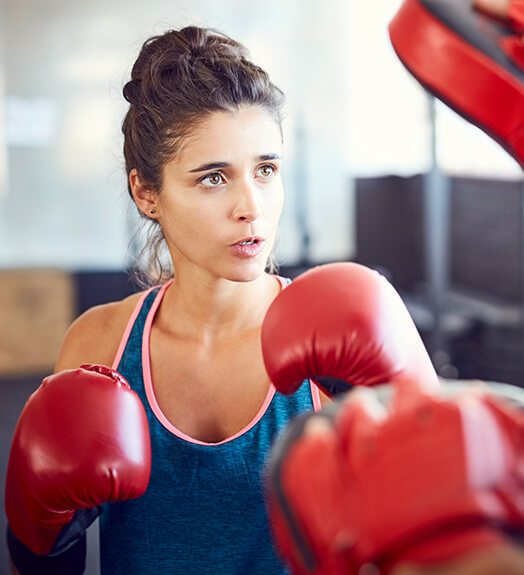 Woman with boxing gloves on